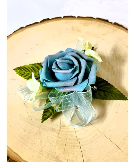 dusty blue silk corsage with ribbon