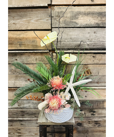 coral toned silk floral arrangement
