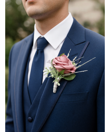 mauve silk rose boutonniere with pearl accents