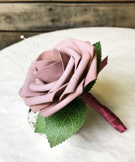 mauve silk rose boutonniere with pearl accents