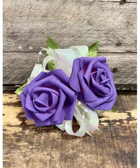 purple corsage with silk rose
