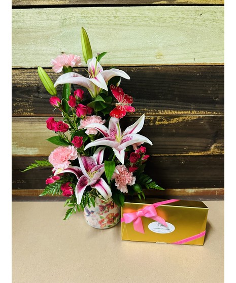 butterfly floral arrangement with chocolates
