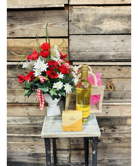 gift set including red and white arrangement and chocolates