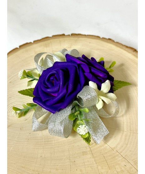 purple corsage with silk rose