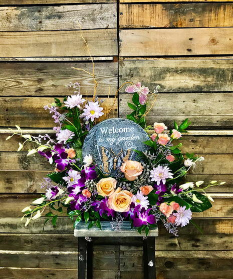 sunflower arrangement with garden stone