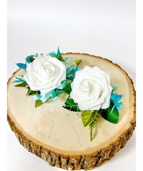 white rose corsage with teal accents