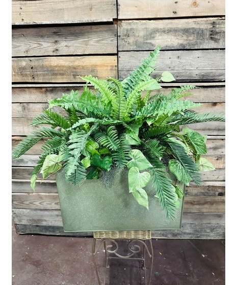 green planter box with silk plants