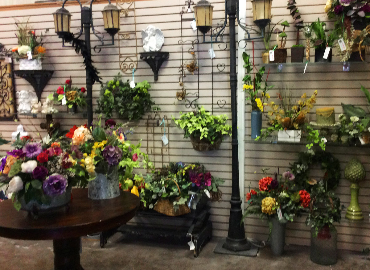 A wide range of colorful floral arrangements, awaiting their new home